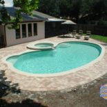 Kidney Shaped Inground Pool with Round Spa